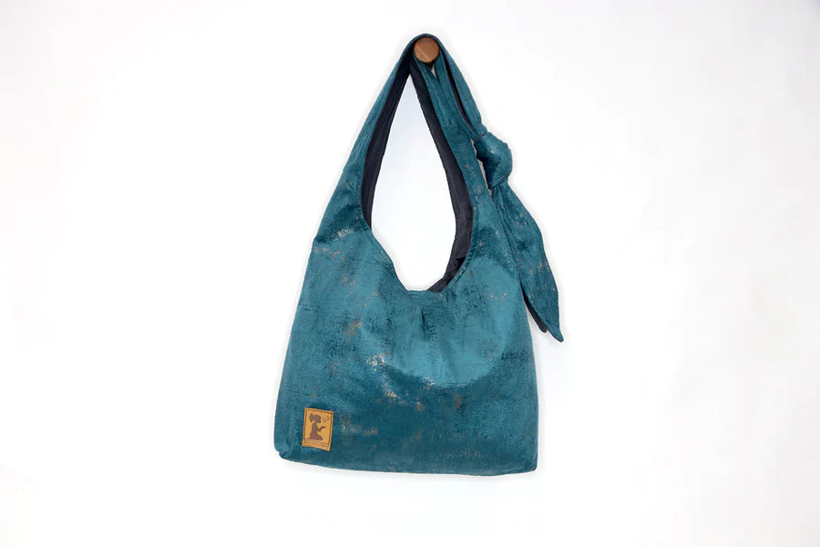 New Hope Girls.  Teal Hobo Bag